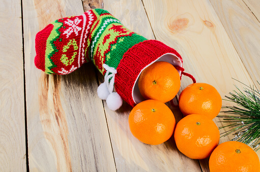 On the table is a colorful Christmas sock.